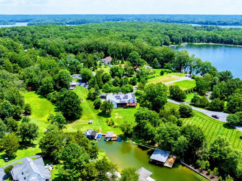 Aerial - Broad view of the Lake Anna shoreline with waterfront properties nestled among the trees.