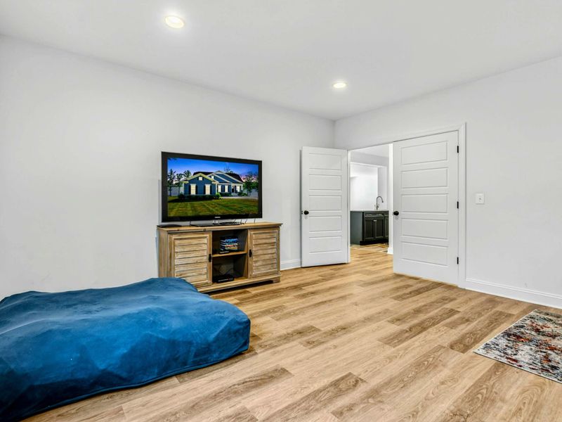 Bunk Room Lounge - Floor cushion and Smart TV give the bunk room its own hangout, ready for movie nights and rainy-day adventures.