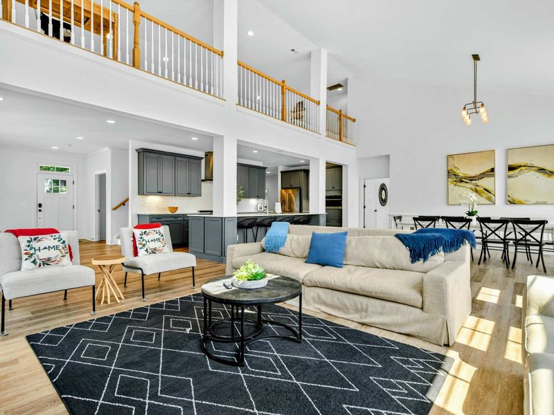 Open Floor Plan - The great room flows seamlessly into the kitchen and dining, with the loft overlooking it all from above.