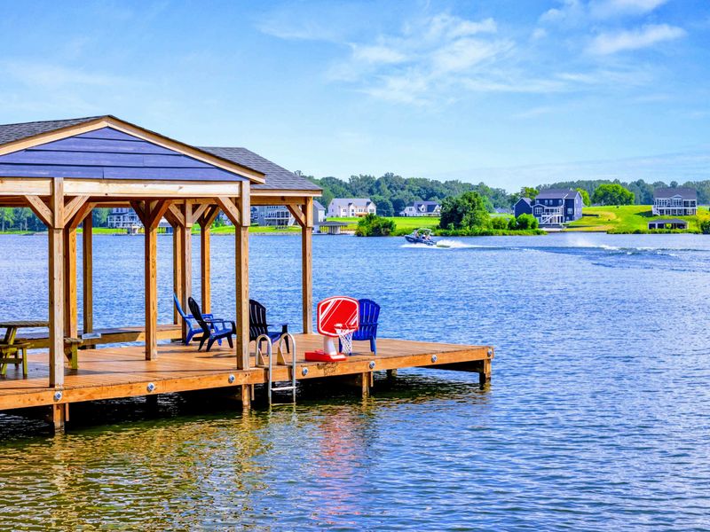 Dock Gazebo - Timber-framed shade over the water with a front-row seat to passing boats, sunsets, and easy conversation.