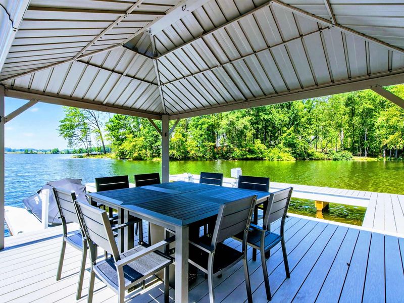 Dock Gazebo - Covered dining area on the dock seats eight with panoramic lake views.