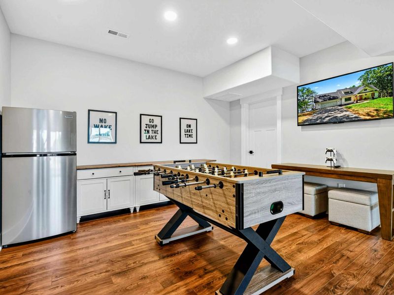 Game Room - Foosball, Smart TV, and kitchenette create the ultimate hangout on the lower level.