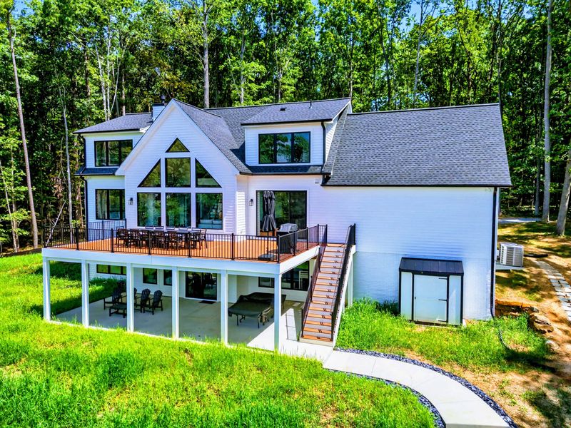 Aerial View - The deck and roofline from directly above, showing the home's modern design.