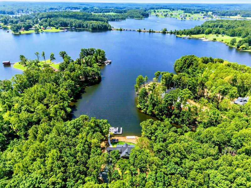 Aerial View - The property's cove setting with Lake Anna's open water beyond.