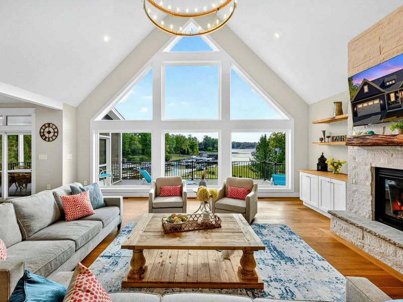Lake View Windows - There is nothing like walking in to Blueberry Bay and seeing the wall of windows and gazing at that lake view! Your biggest decision is which activity to do first - kayaking, beaching, hot-tub, or just relax and take in the views!