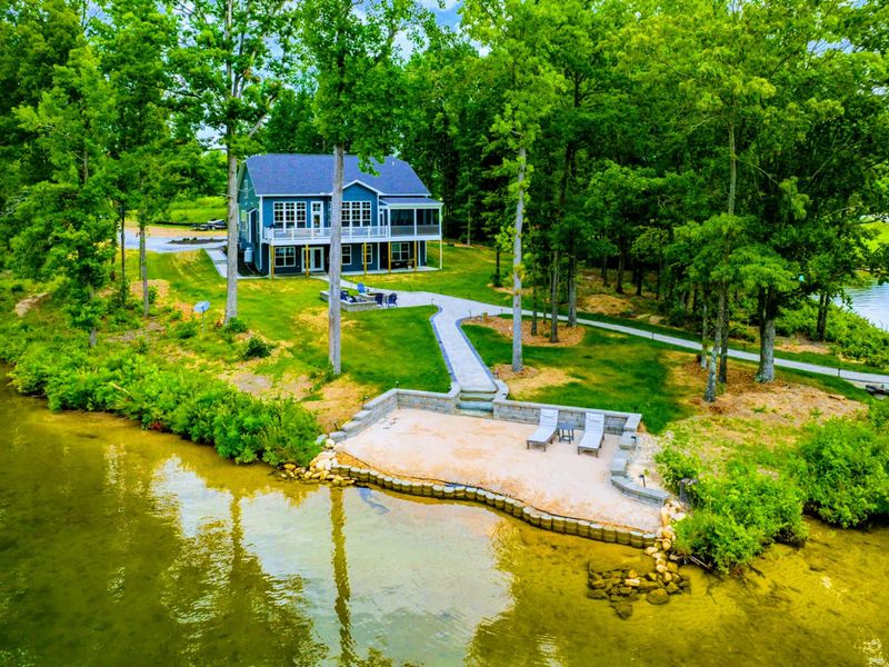 Private Beach! You will love the 250 feet of Lake Anna shoreline with a gently sloped naturally sandy bottom, and warm freshwater.