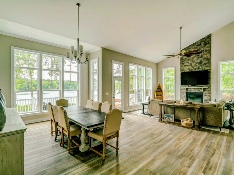Dining area with a nice real wood table and comfortable seating for 8!