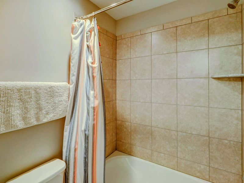 Upstairs bathroom with large double sink vanity and bath tub!