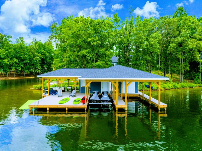 Our dock and boathouse has everything you need to relax and have fun!