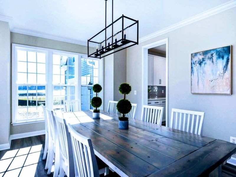 Dining Room - Room for the whole group at one table, an industrial chandelier above, and an easy step into the kitchen.