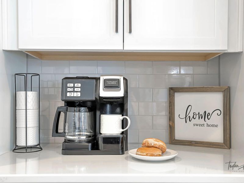 Coffee Bar - Drip and single-serve side by side, so the early risers and the late sleepers each get their first cup their way.