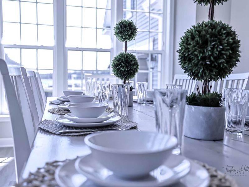 Table for Ten - White dishware, glassware, and the right number of seats: the night you cook in feels like the right call.