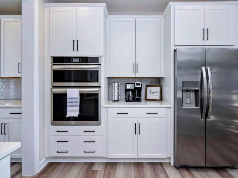 Appliance Wall - Double oven, microwave, and side-by-side fridge keep a big group fed without anyone getting in each other's way.