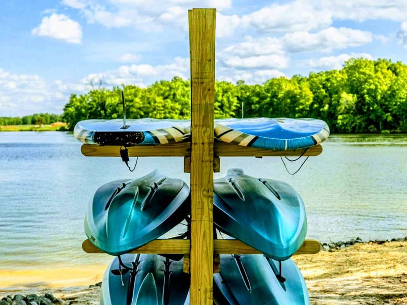 Adventure awaits with complimentary use of our 4 Kayaks and 2 Paddleboards, perfect for exploring the serene lake just steps away from your door!