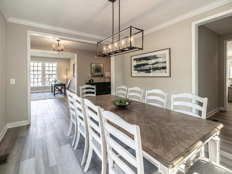 Enjoy elegant meals in our spacious dining area that boasts a large table for family gatherings