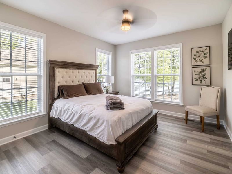 Unwind in this elegantly appointed bedroom with a luxurious bed, soft lighting, and peaceful views, ensuring a restful night’s sleep