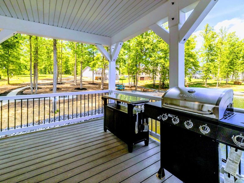 Enjoy lakeside grilling and dining on our spacious covered deck, perfect for entertaining or a quiet family meal