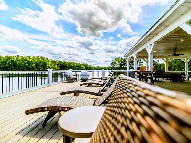 Enjoy serene lake views from our spacious deck, perfect for tanning and soaking up the sun!