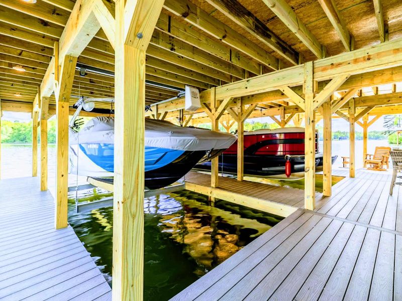Dockside serenity awaits, with direct access to the water for your boating and relaxation pleasures