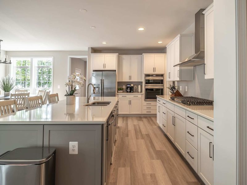 Indulge in the comfort of our spacious and modern kitchen, equipped with top-of-the-line new stainless steel appliances and a huge island, perfect for cooking and socializing!