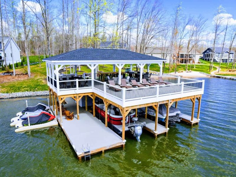 Your family will enjoy our large private lakefront lot with ~300' of waterfront property, a private sandy beach, amazing private 2 story dock and boat house with large comfy lounge area for relaxation!