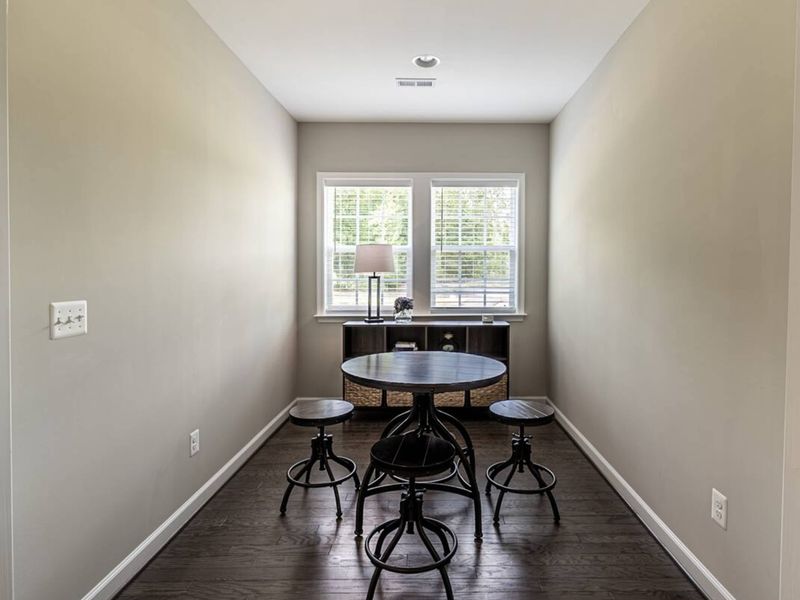 Enjoy intimate conversations, card games, or a quiet work space in our cozy nook featuring a stylish round table and comfortable seating by the window!