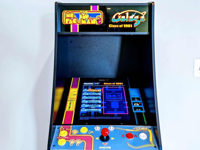 Enjoy a nostalgic gaming experience with our classic arcade machine featuring Ms. Pac-Man and Galaga.