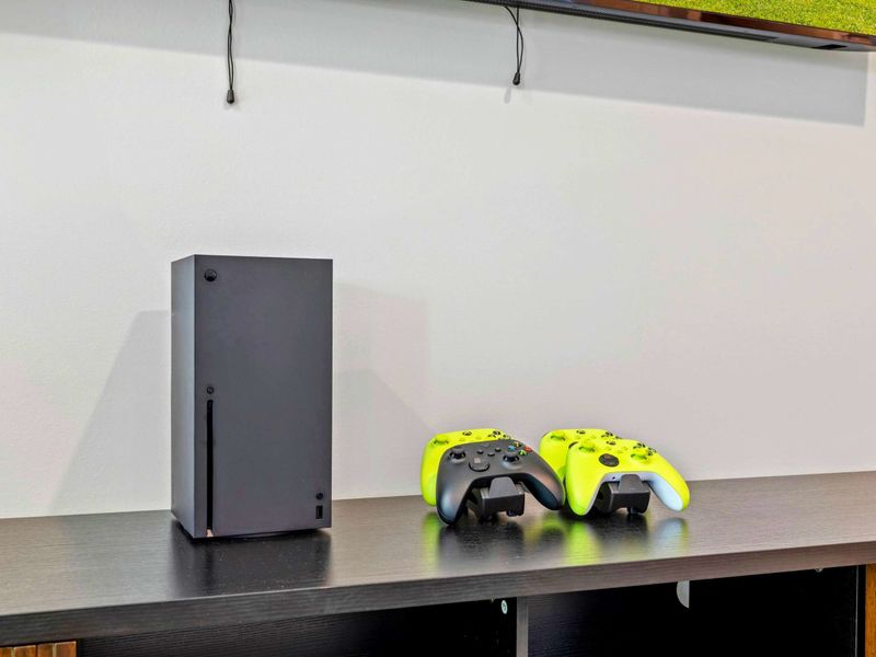 Gaming console with controllers for your entertainment.