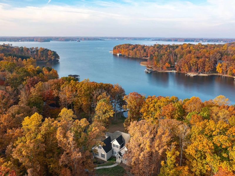 Aerial photo of house and lake
