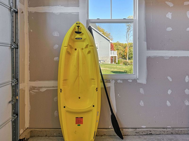 Lake Days, Your Way – Kayaks ready whenever the water calls for a quick family paddle.