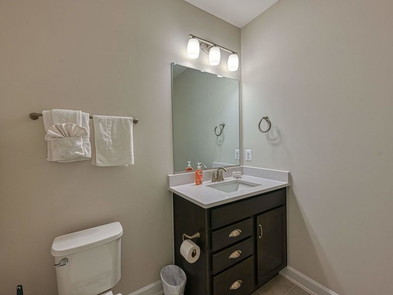 Fresh & Welcoming – A bright bathroom designed to make guests feel comfortable and at home.