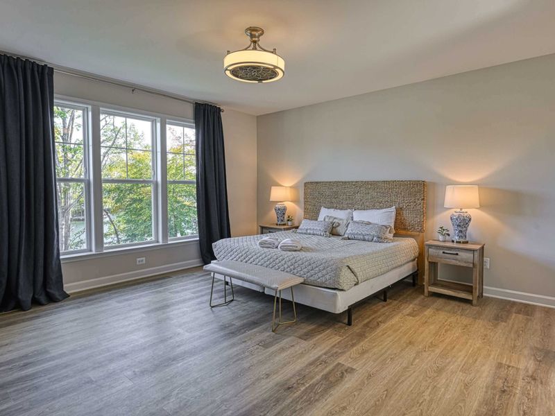 A Quiet Retreat – After lake days and family dinners, unwind in a bedroom designed for deep rest and easy mornings.