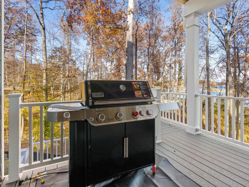 Propane Grill - A full-size gas grill on the lower deck, ready for cookouts with the lake as your backdrop.
