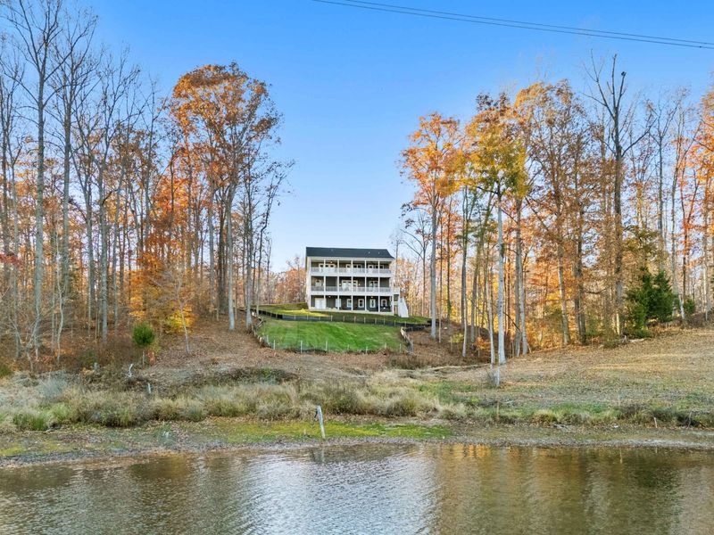 From the Lake - The Overlook as seen from the water, with its three tiers of decks rising above the lakefront.