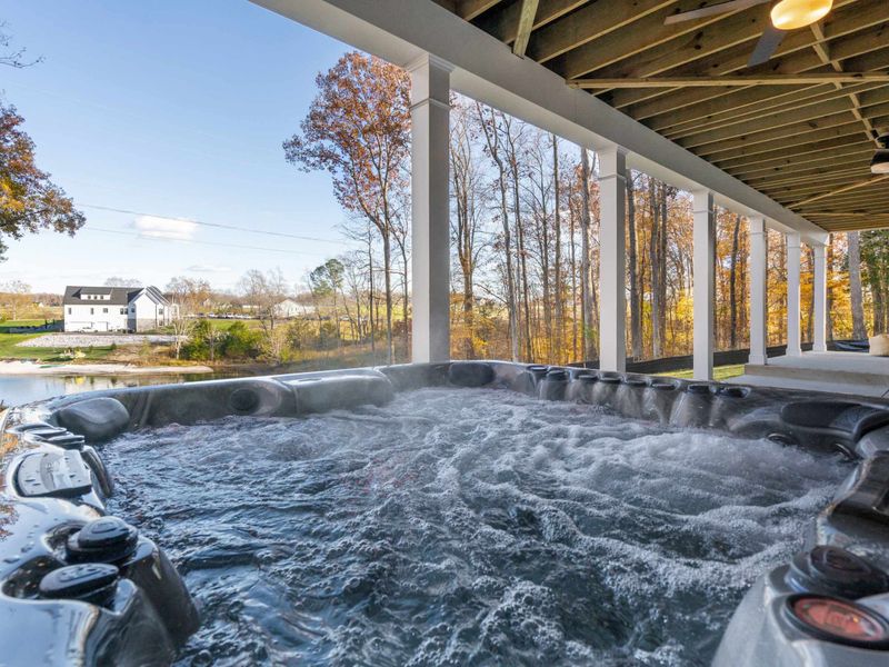 Hot Tub Views - The bubbling hot tub on the lower deck, looking out toward the neighborhood and the lake.