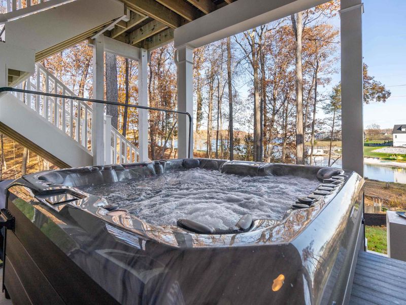 Hot Tub - Soak under the trees with lake views, tucked beneath the upper deck for a private retreat after a day on the water.