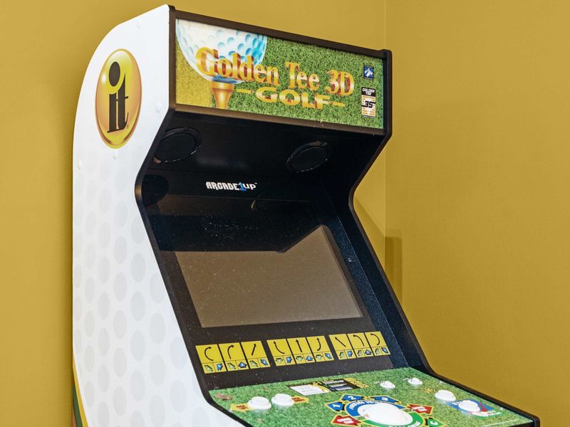 Golden Tee Golf - A Golden Tee 3D Golf arcade machine for virtual rounds between real lake days.