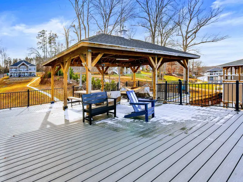Upper Deck - Sliding glass doors open from the great room onto the deck, making indoor-outdoor living effortless.