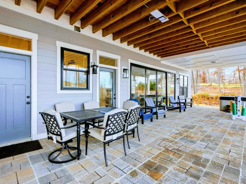 Sunroom Flow - The sunroom connects to the main living space, making it easy to move between gathering areas.