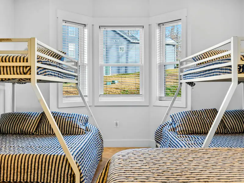 Bunk Room - The twin-over-full bunks tucked between bay windows make the most of this family-friendly space.