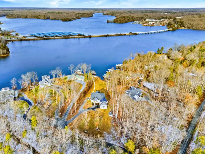 Lake Anna - A sweeping aerial of the lake, bridge, and surrounding coves stretching to the distance.