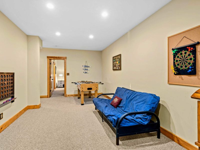 Game Room - Giant Connect Four, magnetic dart board, and foosball table keep everyone entertained on rainy days.