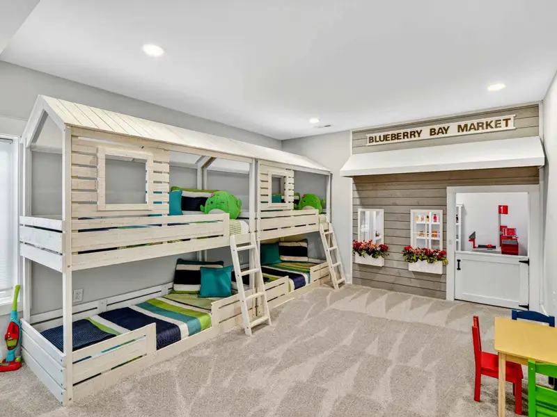 Our quad bunks and custom built "Blueberry Bay Market" playhouse is one of a kind! Kids will never want to leave! Wait until you step inside the market with it's "Target" check-out and built in grocery store with stocked shelves - it's a kids dream!