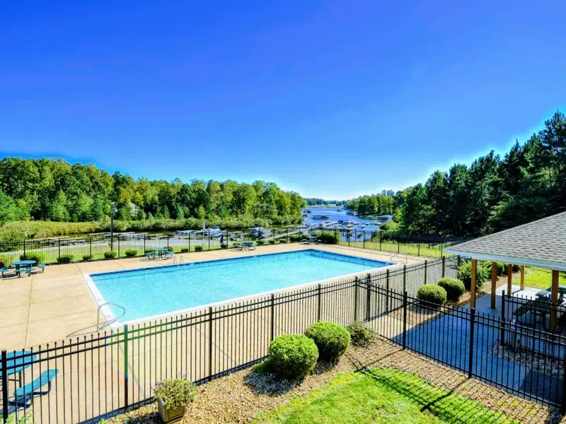 What sets the community of The Waters apart is that it is the only community with a  resort-style pool with tennis/pickleball, a community beach with a playground, marina, available to all guests and the pool/courts/marina next door to Blueberry Bay!