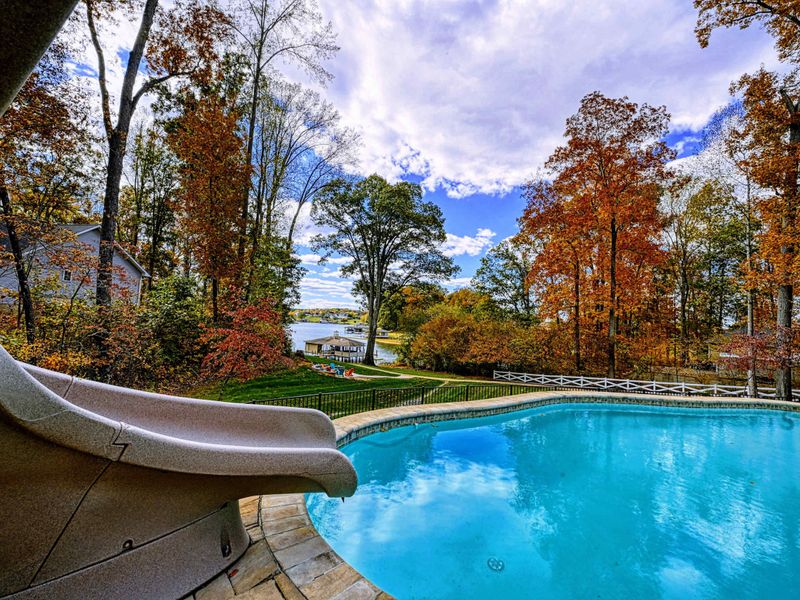 Custom water slide leading straight into the pool — a kid favorite and a grown- up guilty pleasure.