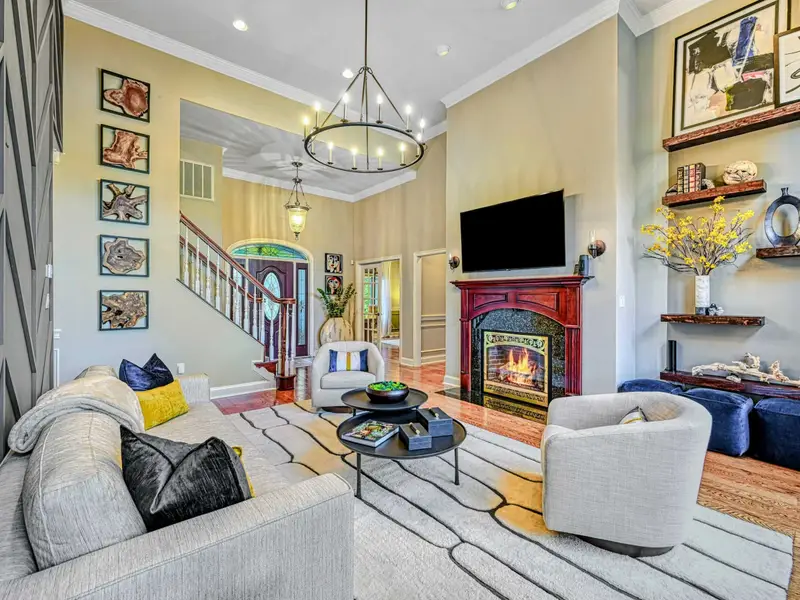 Step through the front door and into a soaring great room that marries classic architecture with curated modern design.
