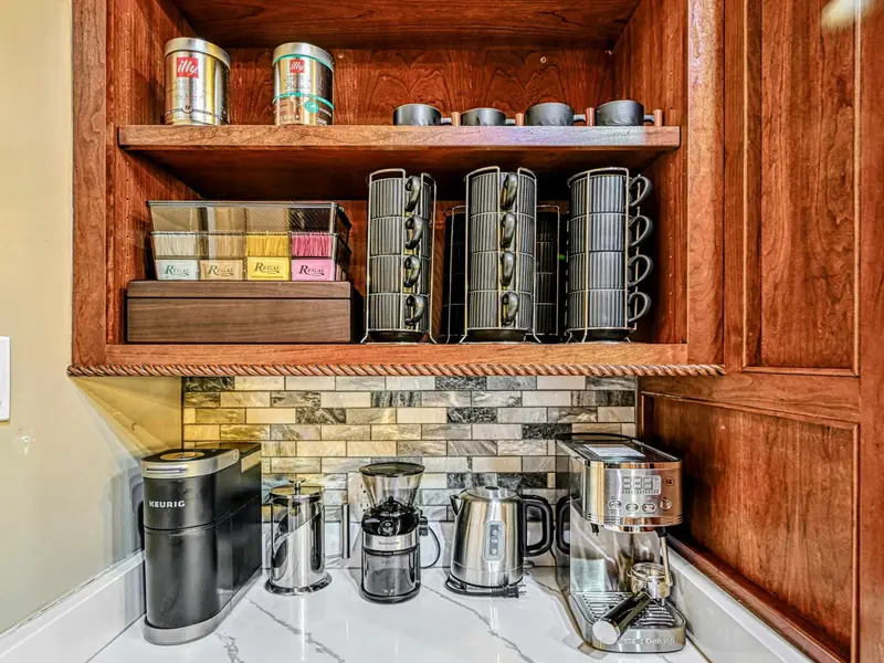 Step into a chef-curated kitchen designed by a former restaurateur—thoughtfully stocked and ready for everything from sunrise espresso to late-night charcuterie and perfectly seared ribeyes.