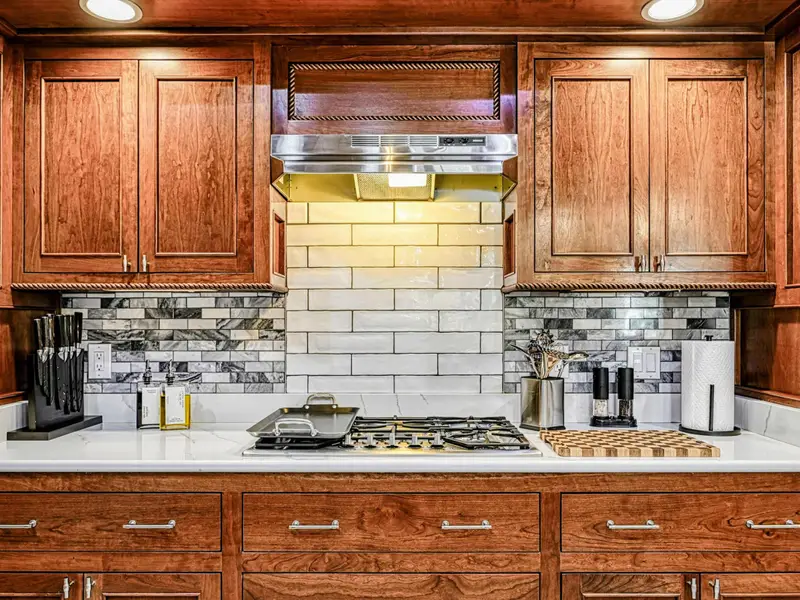 Step into a chef-curated kitchen designed by a former restaurateur—thoughtfully stocked and ready for everything from sunrise espresso to late-night charcuterie and perfectly seared ribeyes.