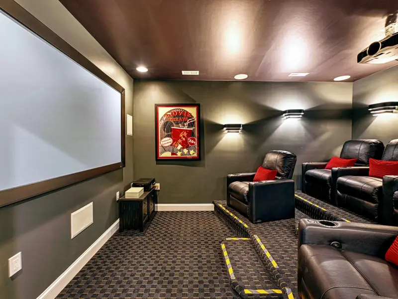 Private Theater: Tiered leather recliners, full projector & Roku, gaming-ready setup, soft lighting, and snacks nearby. Perfect for movie marathons, rom-com nights, or late-night popcorn—lakefront style magic!
