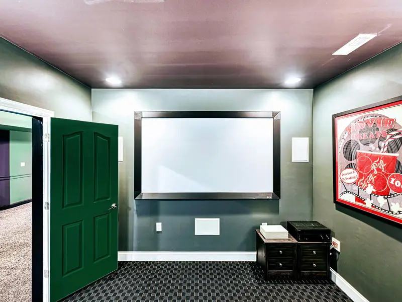 Private Theater: Tiered leather recliners, full projector & Roku, gaming-ready setup, soft lighting, and snacks nearby. Perfect for movie marathons, rom-com nights, or late-night popcorn—lakefront style magic!